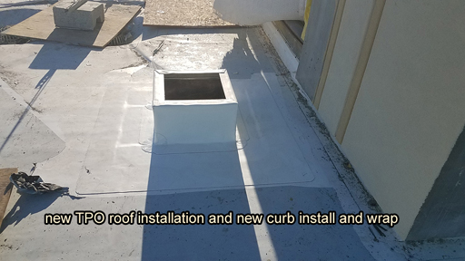 Pipe penetration in BUR Rolled Asphalt Modified Roof, has four voids at the base, with water pooled in the interior.