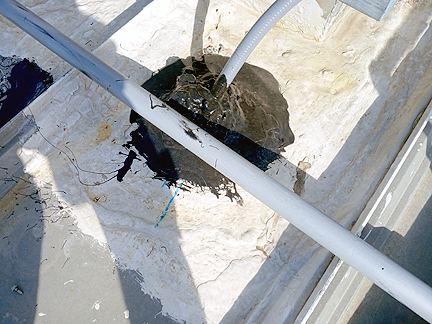 Roof Leak SME - Before pic of old pitch pocket with a mixture of materials used